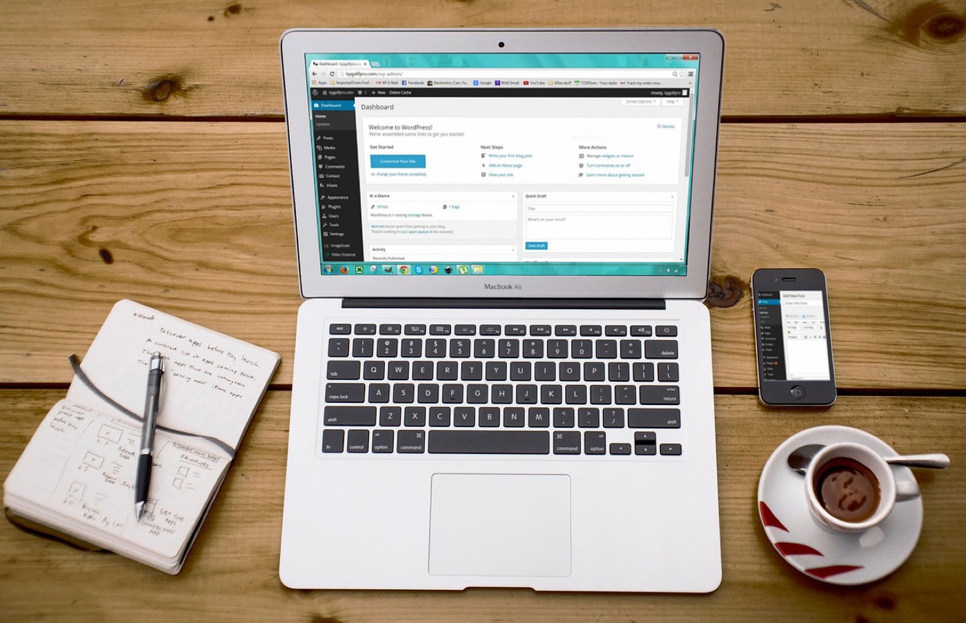 Study materials, a notebook and a phone learning app